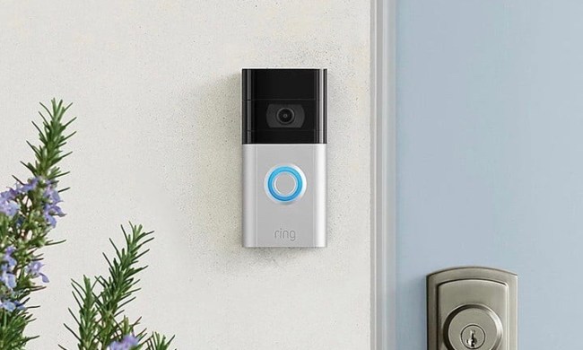 The Ring Video Doorbell 3 installed near a door.